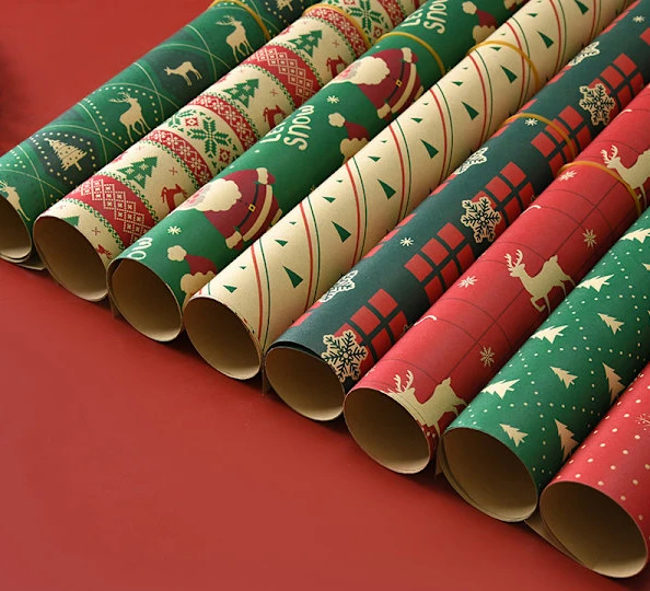 8-pack med 8 mönster av julpapper Jultomte