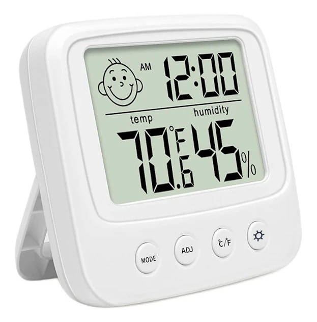 Termometer, hygrometer och elektronisk intern klocka