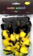 Tvåfärgade pom-poms gul och svart 25-40 mm 21 st